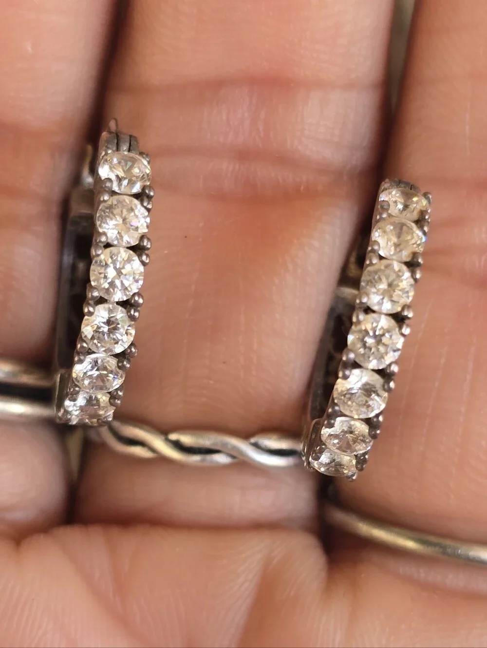 Elegant channel set sparkling CZ diamonds half filigree hoop earrings